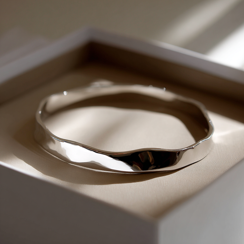 20251007_1713_Silver Bracelet Elegance_remix_01k6zknjakefav6567bhg7vsn4 1.png