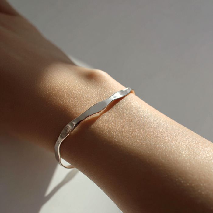 20251007_1713_Silver Bracelet Elegance_remix_01k6zknjakefav6567bhg7vsn4 2.png